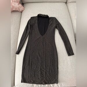 Dress with open back and golden detail in size M